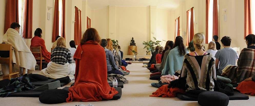 A sacred and safe ceremony space for Ayahuasca retreats in Miami, featuring comfortable mats and traditional Shipibo decor.